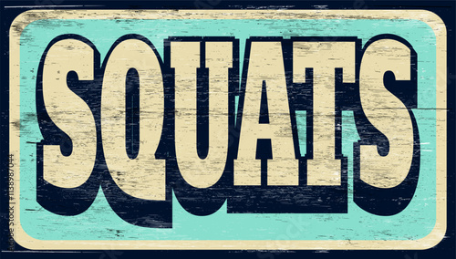 Aged and worn squats sign on wood