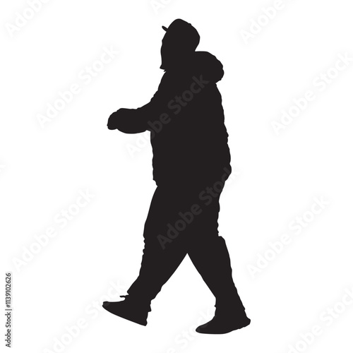 A silhouette of a man walking