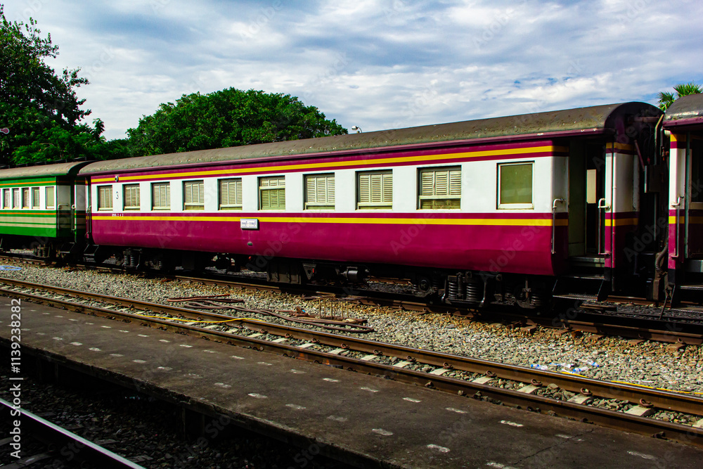 Railway train on the railroad tracks Railway train on the railroad tracks