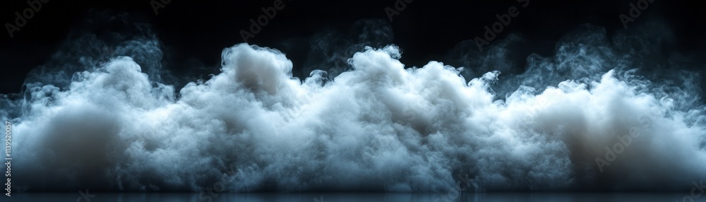 Obraz premium Dense white fog rolls across a dark expanse, creating an ethereal and calm environment