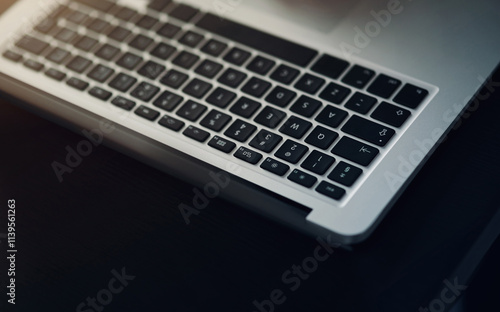 Closeup, empty and laptop with keyboard, technology and business with digital connection. Pc, computer and communication with blockchain, electronic equipment and update for website and network