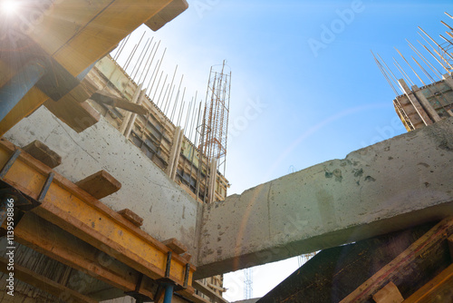 Formwork supports the second floor of a monolithic building. Reinforcement of walls and ceiling. Monolithic work during the construction of a building close-up. construction technologies photo