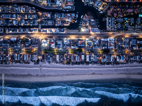 Coastal Road and Homes Overlooking the Ocean at Night photo