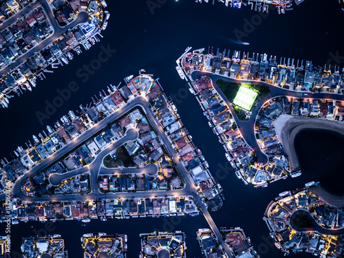 Illuminated Marina and Waterfront Homes at Night in Huntington Beach photo