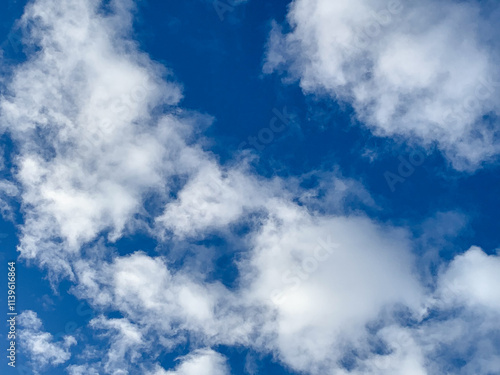 Clear blue skies with clouds photo