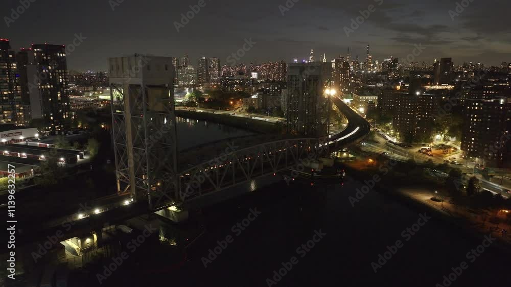 Aerial view of the Metro North Railroad leaving New York City. Shot at night. Aerial view of the Metro North Railroad leaving New York City. Shot at night.