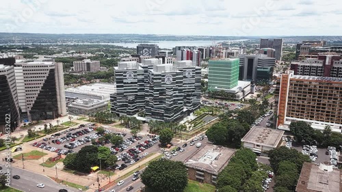 DRONE OVERFLY BETWEEN BUILDINGS IN BRASILIA, FEDERAL DISTRICT, BRAZIL, FEDERAL POLICE BUILDING photo