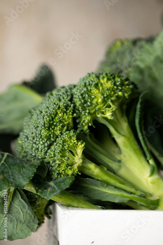 Wallpaper Mural Fresh raw broccoli on table. Healthy vegetable ingredients
 Torontodigital.ca