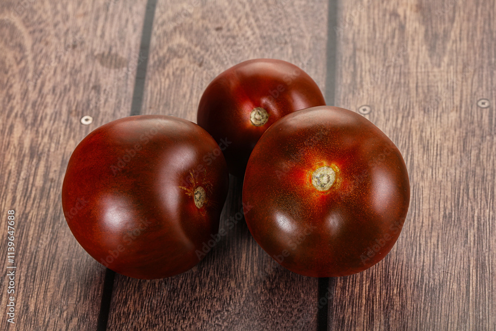 Obraz premium Organic natural juicy Kumato tomato