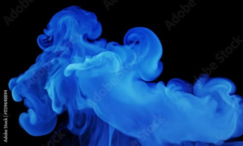 Abstract blue smoke blowing around black background.