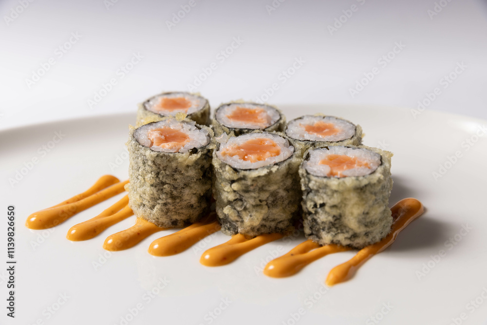 Sushi serving on white plate Sushi serving on white plate