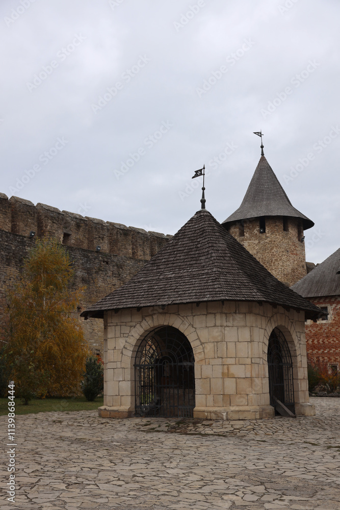 Fototapeta premium Khotyn fortess, castle in Ukraine in autumn. One of seven wonders of Ukraine. Exterior view of Khotyn Fortress, fortification complex on Dniester bank in Khotyn town, outdoors