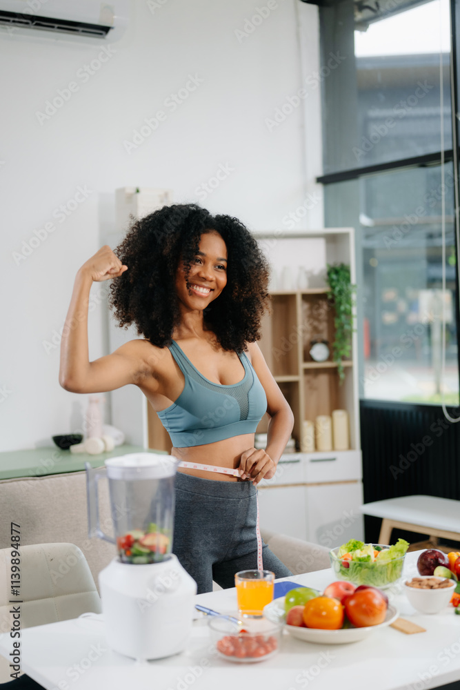 Smiling woman in a modern kitchen with fresh fruits, vegetables, blender, and orange juice, promoting clean eating, wellness Smiling woman in a modern kitchen with fresh fruits, vegetables, blender, and orange juice, promoting clean eating, wellness