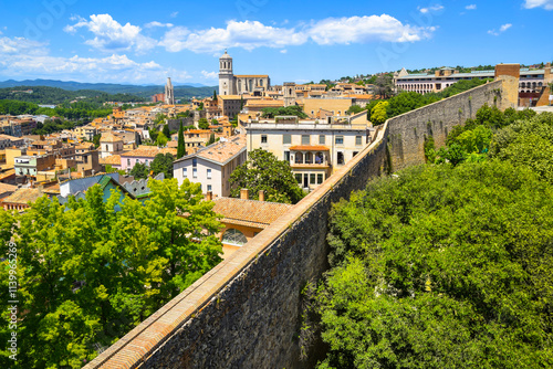 Panoramic aerial view of Girona, defensive walls and cathedral, Catalonia, Spain.