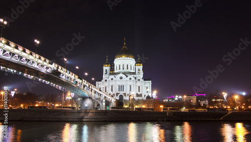 Majestic orthodox Cathedral of Christ Saviour and bridge at dusk on bank of Moscow river. Timelapse hyperlapse, Russia