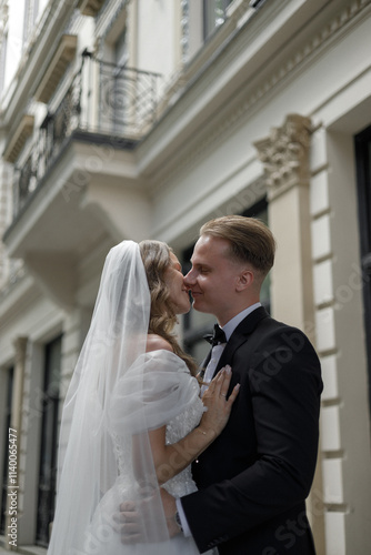 A Romantic Wedding Kiss Captured in an Elegant Setting Filled with Joy and Beauty