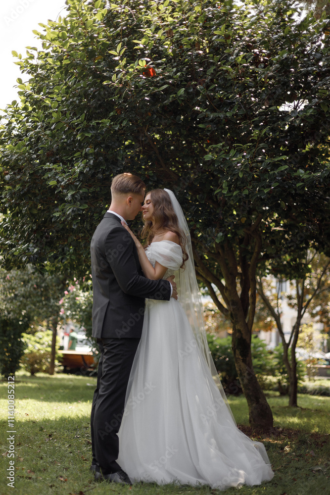 Beautiful and Elegant Wedding Ceremony in a Stunning Lush Garden Setting Outdoors Beautiful and Elegant Wedding Ceremony in a Stunning Lush Garden Setting Outdoors