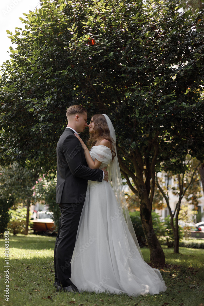 Beautiful and Elegant Wedding Ceremony in a Stunning Lush Garden Setting Outdoors Beautiful and Elegant Wedding Ceremony in a Stunning Lush Garden Setting Outdoors