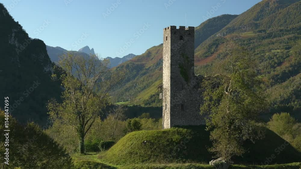 View on the tower of Castet with the pic du midi d'Ossau in the background. View on the tower of Castet with the pic du midi d'Ossau in the background.
