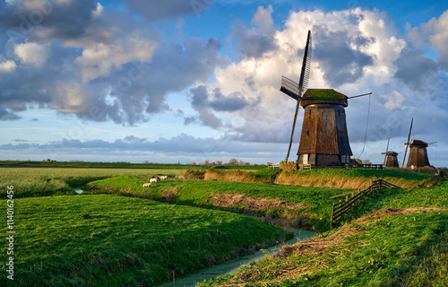 dutch windmill in the country photo