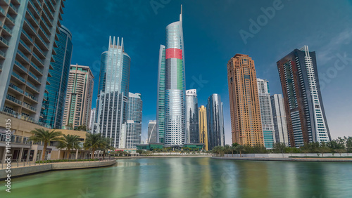 Residential buildings in Jumeirah Lake Towers timelapse hyperlapse in Dubai, UAE. photo