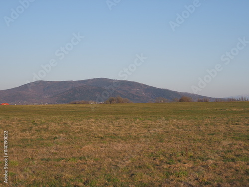 Fototapeta Naklejka Na Ścianę i Meble -  Mount and field at Bielsko-Biala city in Poland