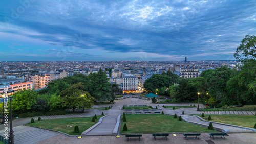 Beautiful Paris cityscape day to night timelapse seen from Montmartre. Paris, France photo