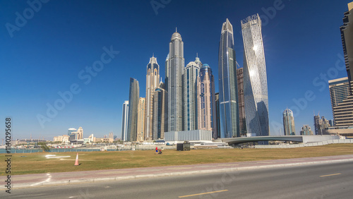 Scenic view of Dubai Marina Skyscrapers with boats timelapse hyperlapse, Skyline, View from sea, United Arab Emirates photo