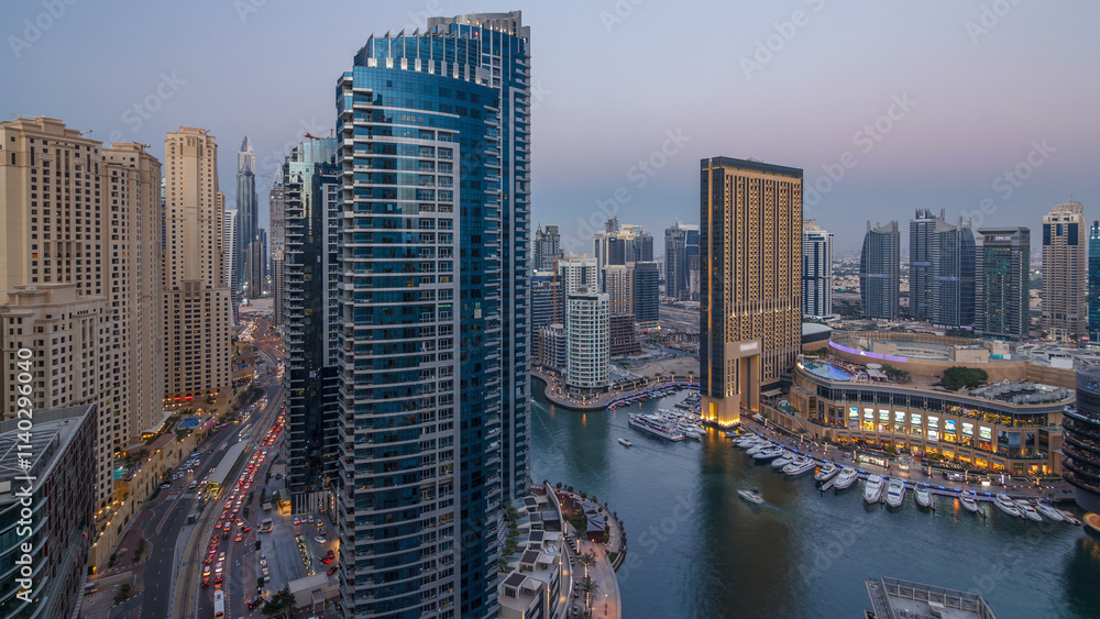 Evening illumination of Dubai Marina day to night aerial timelapse, UAE. Evening illumination of Dubai Marina day to night aerial timelapse, UAE.