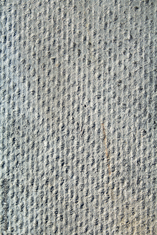 Slate relief texture close-up: play of light and shadow on natural material. Slate relief texture close-up: play of light and shadow on natural material.