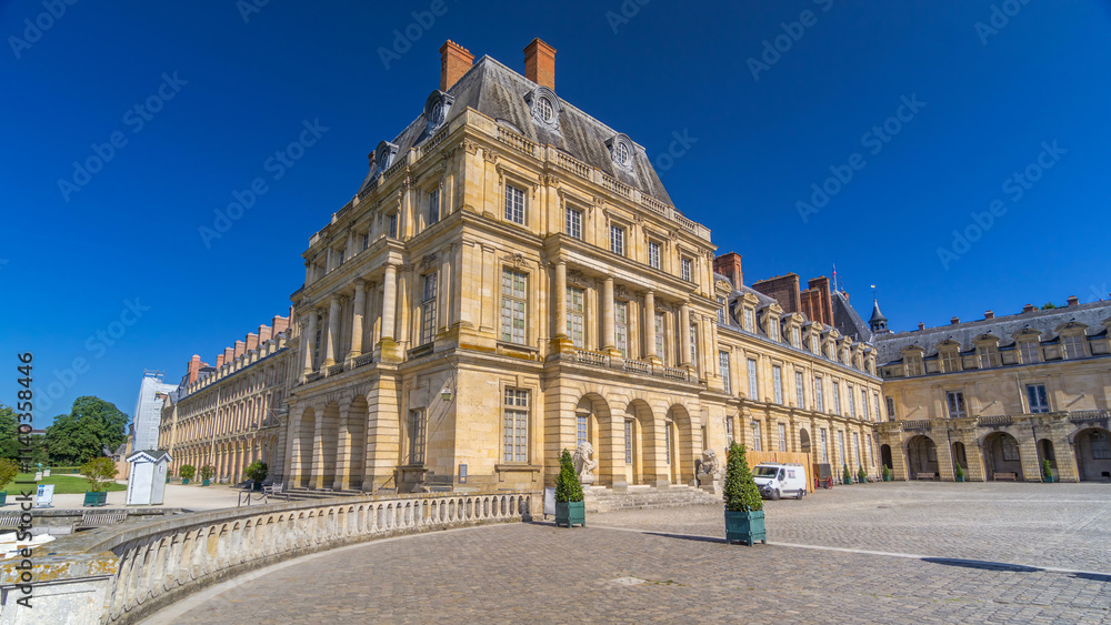 Fototapeta premium Beautiful Medieval landmark - royal hunting castle Fontainbleau timelapse hyperlapse.