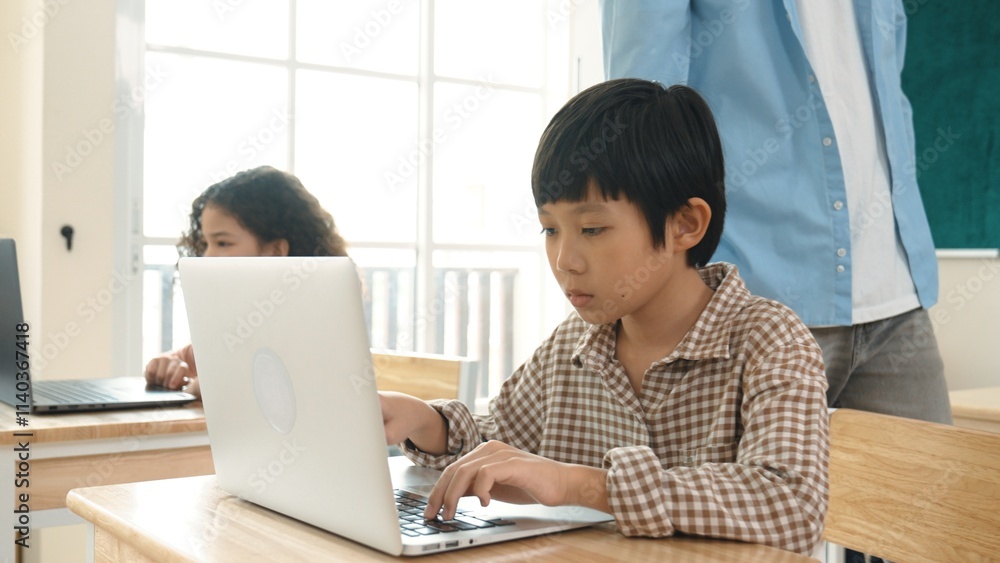 Caucasian teacher helping asian student coding engineering prompt while diverse student using software generated AI. Smart happy attractive children sitting and programing system. Education. Pedagogy. Caucasian teacher helping asian student coding engineering prompt while diverse student using software generated AI. Smart happy attractive children sitting and programing system. Education. Pedagogy.