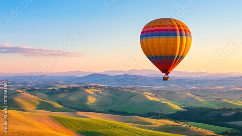 Vibrant Hot Air Balloon Soaring Over Serene Rolling Hills at Sunrise
