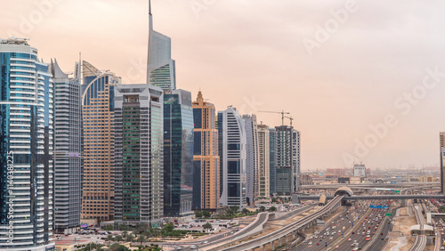 Aerial top view to Sheikh Zayed road near Dubai Marina and JLT day to night timelapse, Dubai.