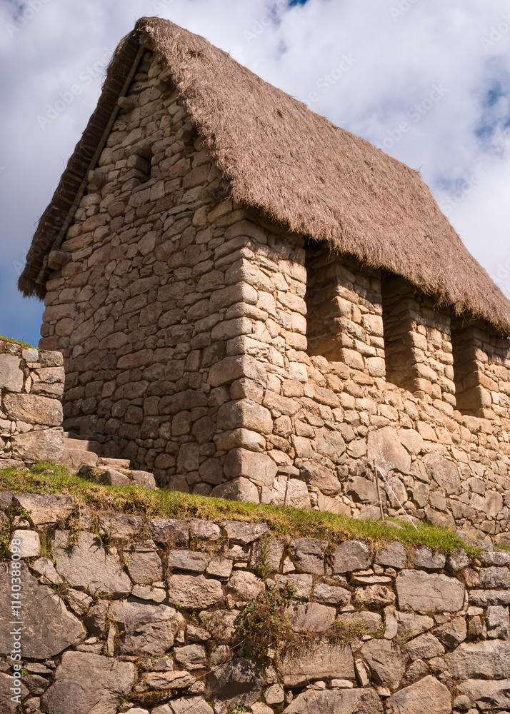 Ancient Stone House with Thatched Roof at Machu Picchu Ancient Stone House with Thatched Roof at Machu Picchu
