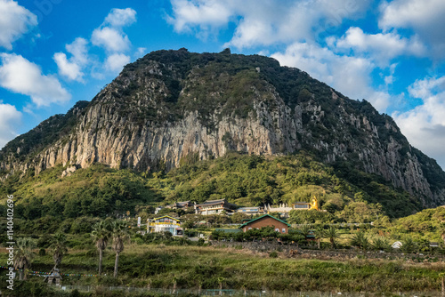 Sanbangsan Mountain and the windswept coast of Jeju Island, South Korea photo