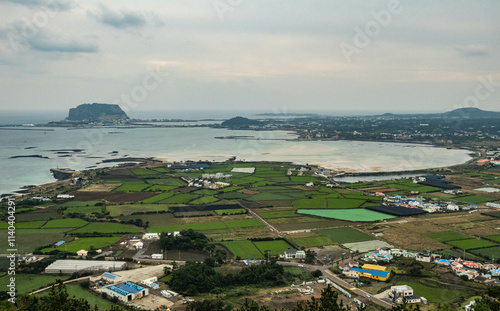 View of Seongsan Ilchulbong from Jimibong Peak, Jongdal, Jeju, South Korea photo