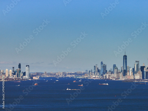 Jersey City and New York skyline across each other over the Hudson river