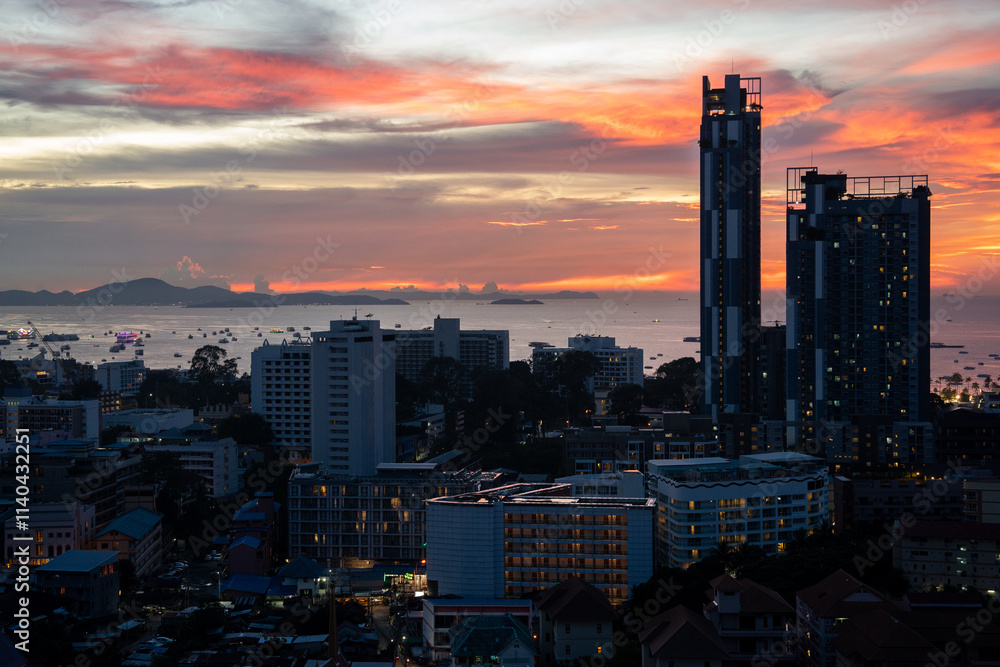 Obraz premium Sunset view from the 22nd floor of a condominium in Pattaya town Chonburi district Thailand Asia