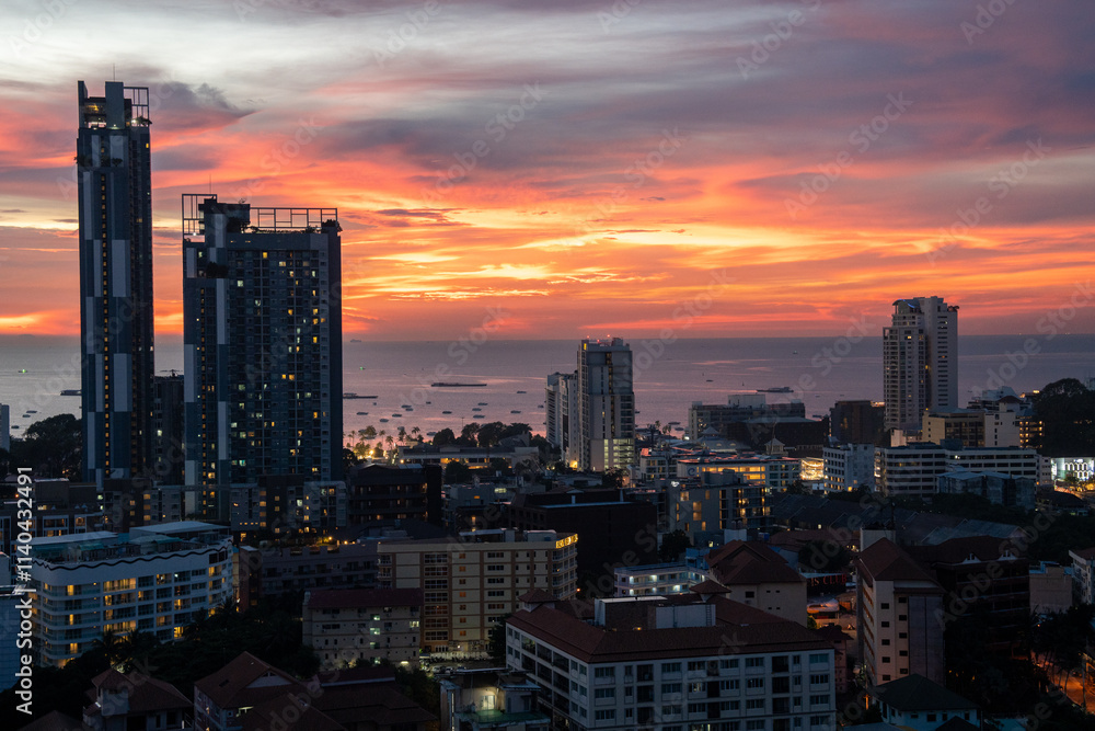 Fototapeta premium Sunset view from the 22nd floor of a condominium in Pattaya town Chonburi district Thailand Asia