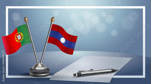 Portugal and Laos National flags on small table with bokeh background, cooperative relationship