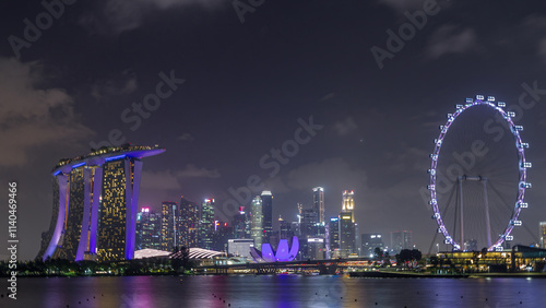 Photography Downtown skyline of Singapore as viewed from across the water from The Garden East night timelapse hyperlapse