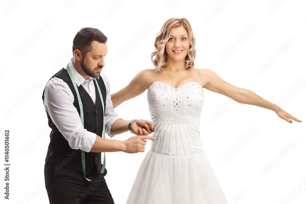 Tailor taking measures for a bridal gown Tailor taking measures for a bridal gown