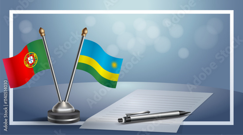 Portugal and Rwanda National flags on small table with bokeh background, cooperative relationship