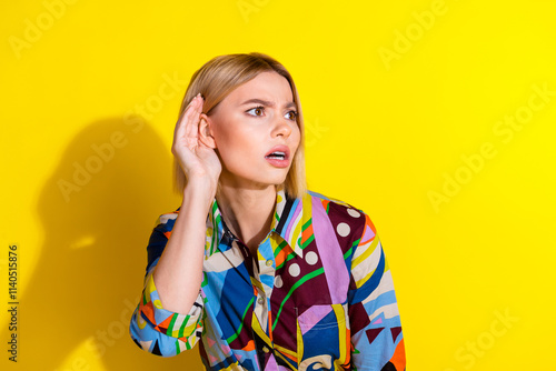 Photo portrait of lovely young lady listen secret cover ear amazed dressed stylish colorful garment isolated on yellow color background photo