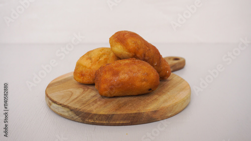 Fried bread or Roti Goreng or Odading isolated white. 