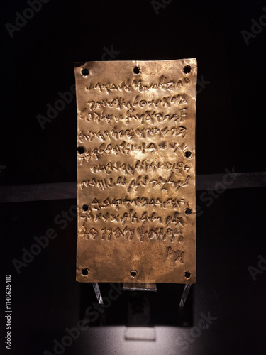 Phoenician Golden Plate in the museum. The Pyrgi Tablet. Phoenician alphabet.