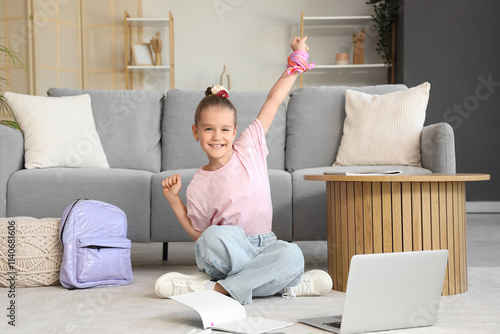 Happy little girl studying ...