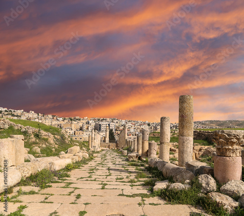 Roman ruins (against the background of a beautiful sky with clouds) in the Jordanian city of Jerash (Gerasa of Antiquity), capital and largest city of Jerash Governorate, Jordan #1140722458