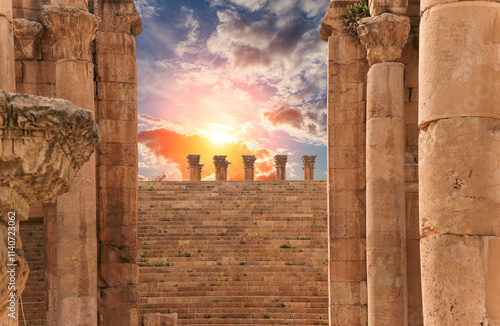 Roman ruins (against the background of a beautiful sky with clouds) in the Jordanian city of Jerash (Gerasa of Antiquity), capital and largest city of Jerash Governorate, Jordan #1140723062